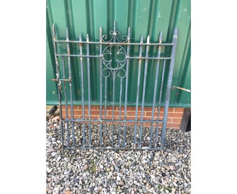 A heavy iron gate. W:100cm x H:120cm