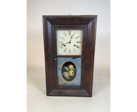 An American wall clock with painted glazed door. 