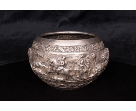 A large Indian silver bowl decorated with detailed hunting and animal scenes. With detail to base. Marked 910 to base. 1014 g