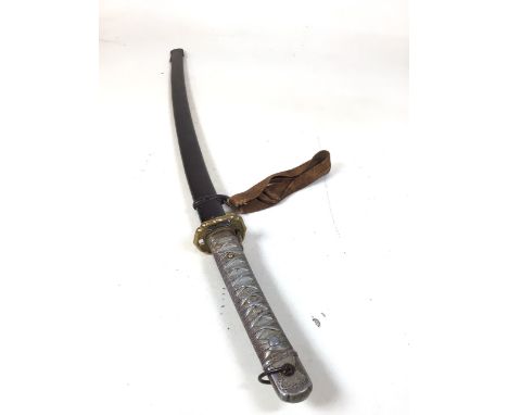 A WWII Japanese Katana, non-commissioned officer sword in scabbard with decorative hilt and canvas handle. Length: 97cm