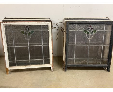 Ten stained glass early 20th century sash windows with reinforcement bar, with original handles.                             