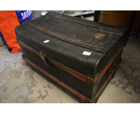 A tin trunk.