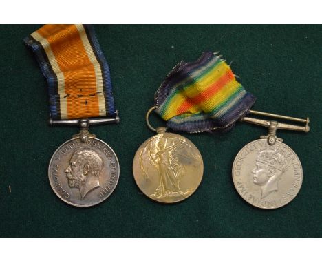 Three military medals to include a 1914-1918 medal presented to 217282 Private A Howell R.A., The Great War for Civilization 