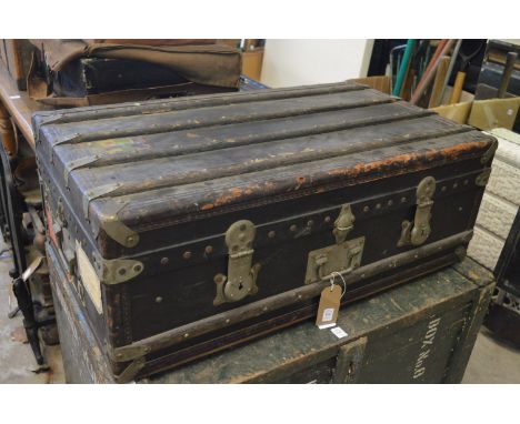 A large travelling trunk.
