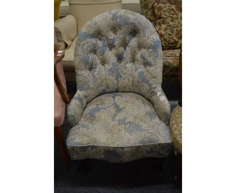 A Victorian button upholstered nursing chair.