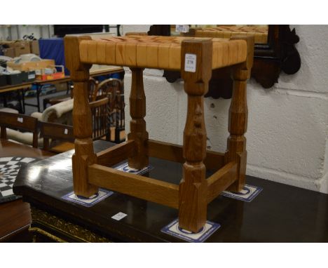 Robert Thompson, a mouseman stool with leather latticework top.