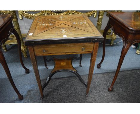 A Victorian inlaid rosewood envelope card table.