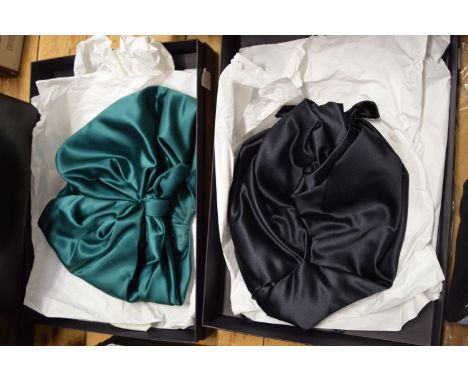 Two Prada ladies hats, boxed.