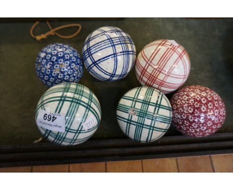 A collection of six 19th Century ceramic carpet bowls, four examples having linea motifs and two examples with mottled decora