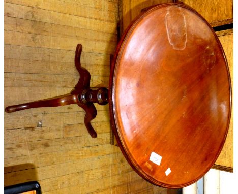 A Georgian mahogany circular topped tripod table.