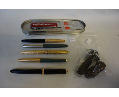 A mixed lot of assorted items to include Swiss army pocket knife, five various Parker pens, etc.