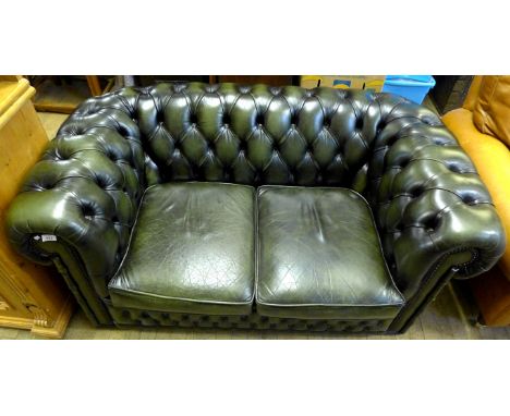 A good quality Chesterfield green leather two seater button back sofa. 