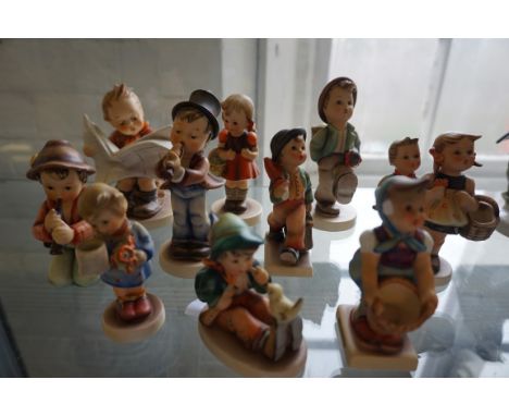 Ten assorted Goebel Hummel figurines.