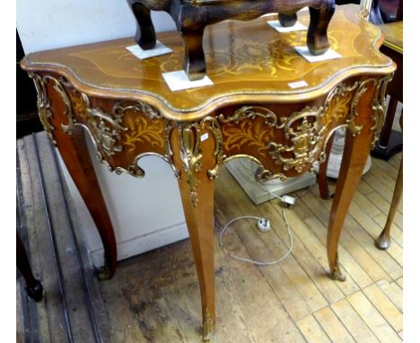 A good quality Louis XV style reproduction console table, having applied brass decoration.