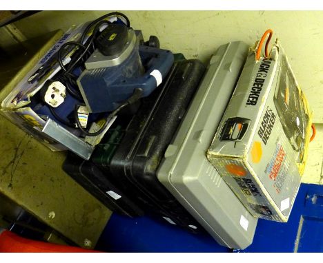 A mixed lot of assorted tools to include Black & Decker electric jigsaw, Bosch jigsaw, a Power Craft belt sander etc. 