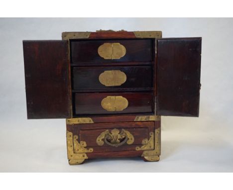 A modern Chinese brass and jade applied jewellery casket.