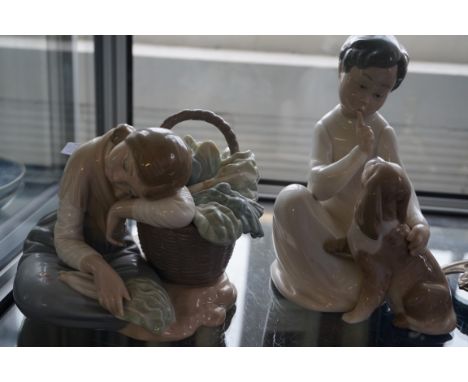 Two Lladro figures one depicting a farming girl.