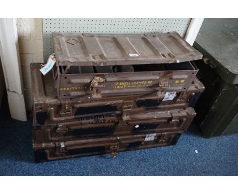 Four green painted military ammunition boxes, mid to late 20th Century, each box with twin carrying handles, three marked wit