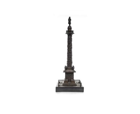 GRAND TOUR CAST BRONZE DESK WEIGHT MODELLED AS THE VENDOME COLUMN 19TH CENTURY on a square black slate base32cm high