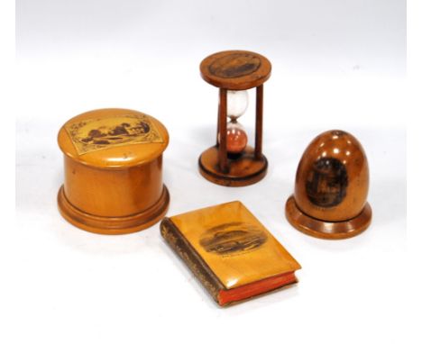 Collection of Mauchline ware comprising a Tantallon Castle timer, Ben Nevis from Corpach miniature bookcase, Doune Castle thr