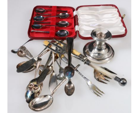 Silver dwarf candlestick, loaded, and various items of EP flatware.