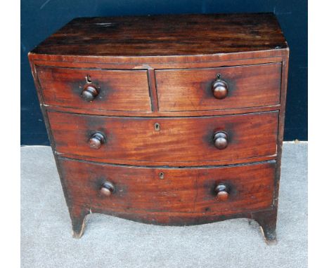 Victorian mahogany bowfront chest of small proportions fitted with two short and two long graduated drawers, shaped apron rai