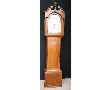 Georgian oak longcase clock by W. Taylor, Dumfries, the swan neck pediment mounted by Ho Ho bird, arched painted dial, Roman 