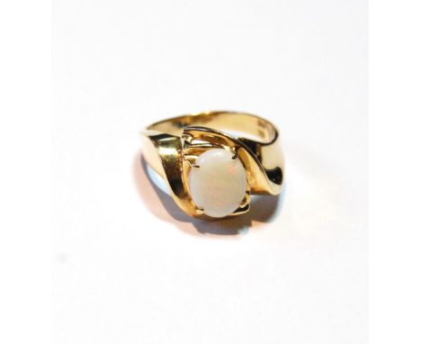 Ring with oval opal in gold scroll mount, '14k', size P.