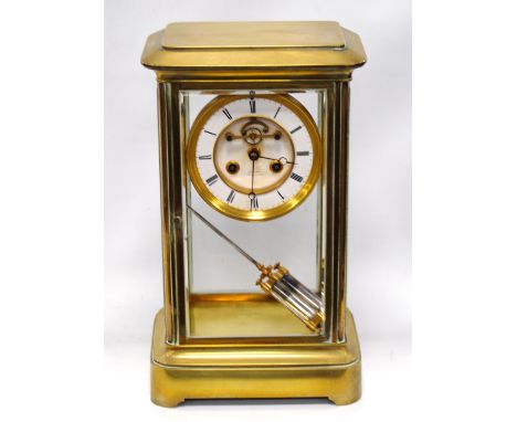 Brass mantel clock by George Farrar, Tunbridge Wells, with mercury pendulum, 22cm wide and 38cm high.