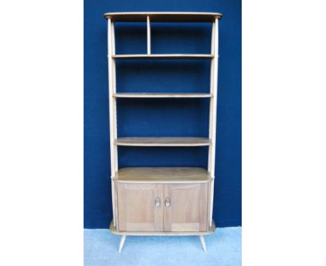 Ercol Golden Dawn beech and elm shelving unit. 90cm wide and 181cm high. Condition Report Good condition, but the shelf suppo