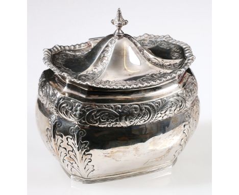 Victorian silver caddy of rectangular boat shape with embossed band and sprays, by Huttons, 1899.