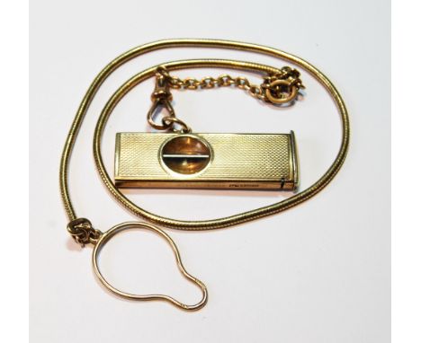 9ct gold snake key chain with engine turned Dunhill cigar cutter, gross 34g.