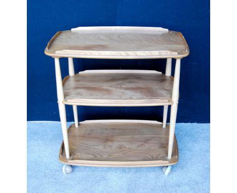 Ercol Golden Dawn beech and elm three-tier trolley, 72cm wide and 77cm high.