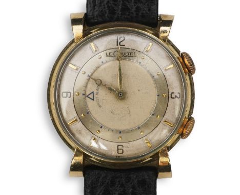 A gentleman's 1950's? 10k gold filled Jaeger LeCoultre Memovox manual wind wrist watch, on a later associated leather strap, 