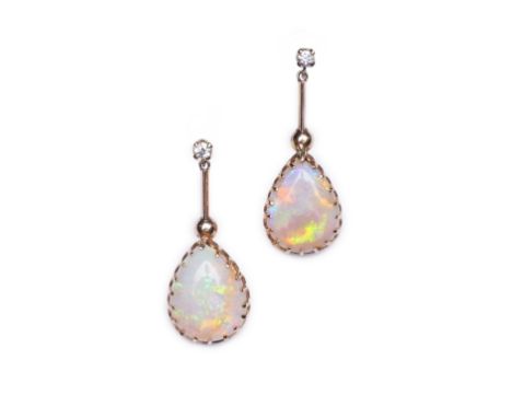 A pair of opal and diamond earrings, each composed of a pear-shaped cabochon opal suspended by a knife wire link from a brill