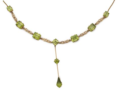 An Edwardian peridot and seed pearl necklace, early 20th century the front composed of links claw-set with step-cut peridots,