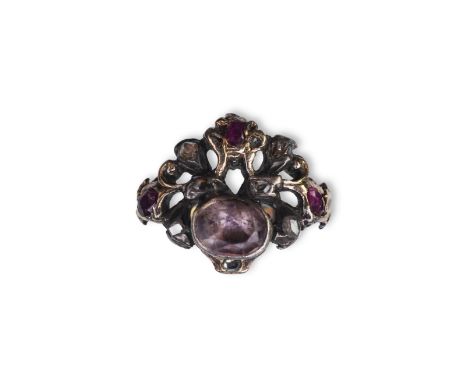 A ruby, rock crystal and diamond ring, of giardinetto design, set with rose-cut diamonds, oval rubies and an oval rock crysta