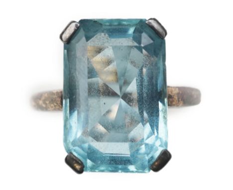 An aquamarine ring, mid 20th century, claw-set with a mixed step-cut aquamarine measuring approximately 14.7 x 10 x 7.4mm, to