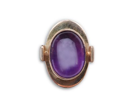 Reeslev, an amethyst ring, Denmark, collet-set with a cabochon amethyst, within a polished oval border, to a U-shaped band, s