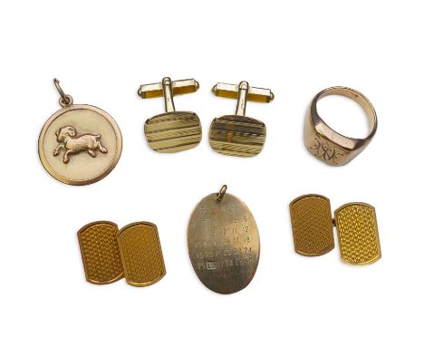 A collection of gold jewels, comprising: a 9ct gold oval pendant engraved with a calendar for the month of September, a diamo