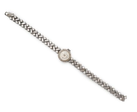 Aster, a stylish lady's diamond cocktail watch, 1960s, the circular silvered dial within a bezel set with single-cut diamonds