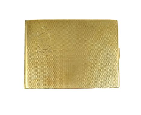 A 9ct gold cigarette case, circa 1929, with engine turned decoration and engraved monogram, length 11.4cm, British hallmarks,