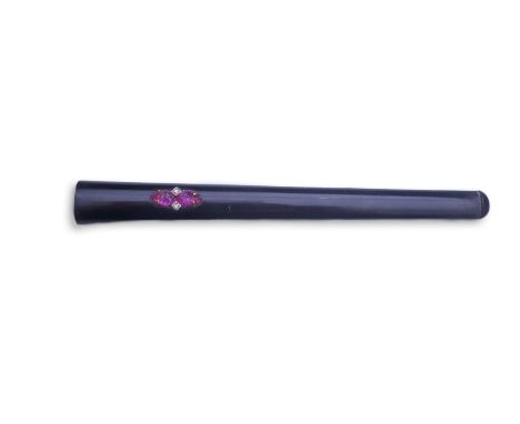 Y Y Cartier, an Art Deco tortoiseshell, ruby and diamond cigarette holder, 1920s, the tapering elongated holder constructed f