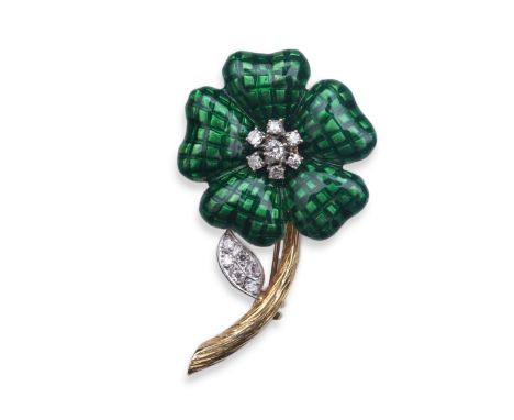 An enamel and diamond brooch, designed as a flower, its petals applied with green enamel in a grid pattern in the style of em
