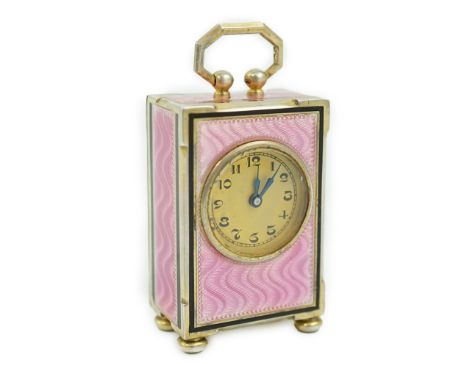 An early 20th century Swiss silver gilt and two colour enamel miniature carriage timepiece, with Arabic dial, on bun feet, ov