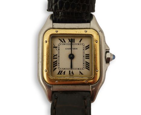 A lady's steel and gold Cartier Panthere quartz wrist watch, now on an associated leather strap, but with original Cartier st