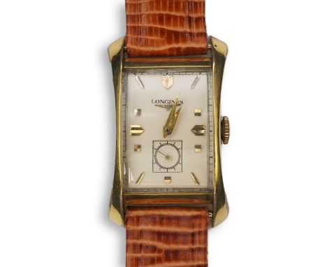 A gentleman's 1950's 10k gold filled Longines manual wind wrist watch, on a later associated leather strap, with shaped recta