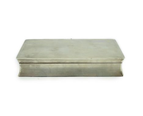 An Elizabeth II engine turned silver cigarette box by Alfred Dunhill, of rectangular form, London, 1961, 19.4cm.  A couple of