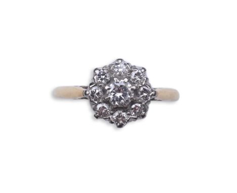 Asprey &amp; Co., a diamond ring, of cluster design, claw-set with brilliant-cut diamonds totalling approximately 0.60 carats