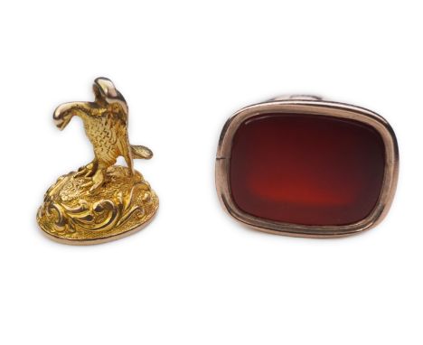 Two Victorian fob seals, 19th century, comprising: a late Victorian white chalcedony fob seal, with eagle surmount the chalce